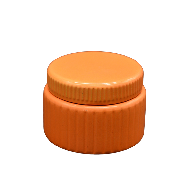 橙色螺旋蜡烛罐